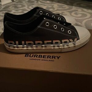 Burberry size 35 worn maybe needs shoelaces but no signs of wear.